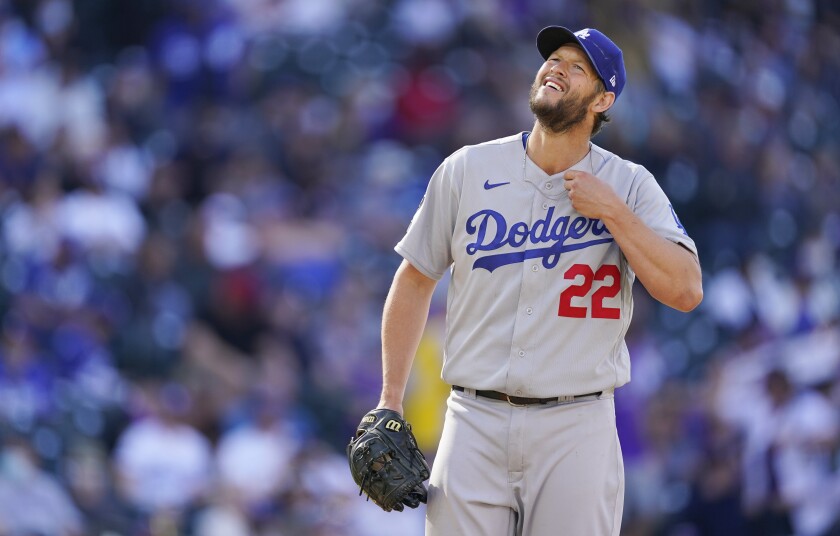 Dodgers pitcher Clayton Kershaw waits to be pulled from the mound.