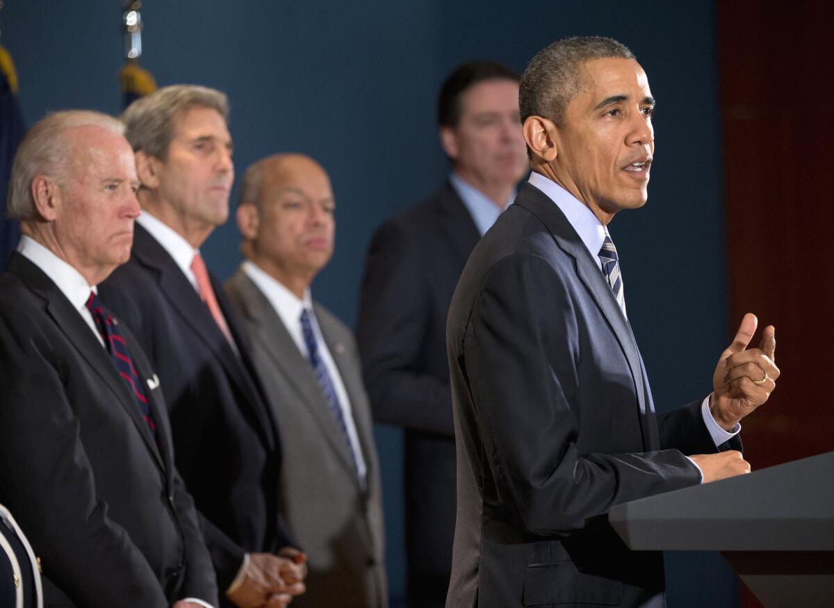 President Obama speaks at the National Counterterrorism Center in McLean, Va. Joining him are, from left, Vice President Joe Biden, Secretary of State John F. Kerry, Homeland Security Secretary Jeh Johnson and FBI Director James Comey.