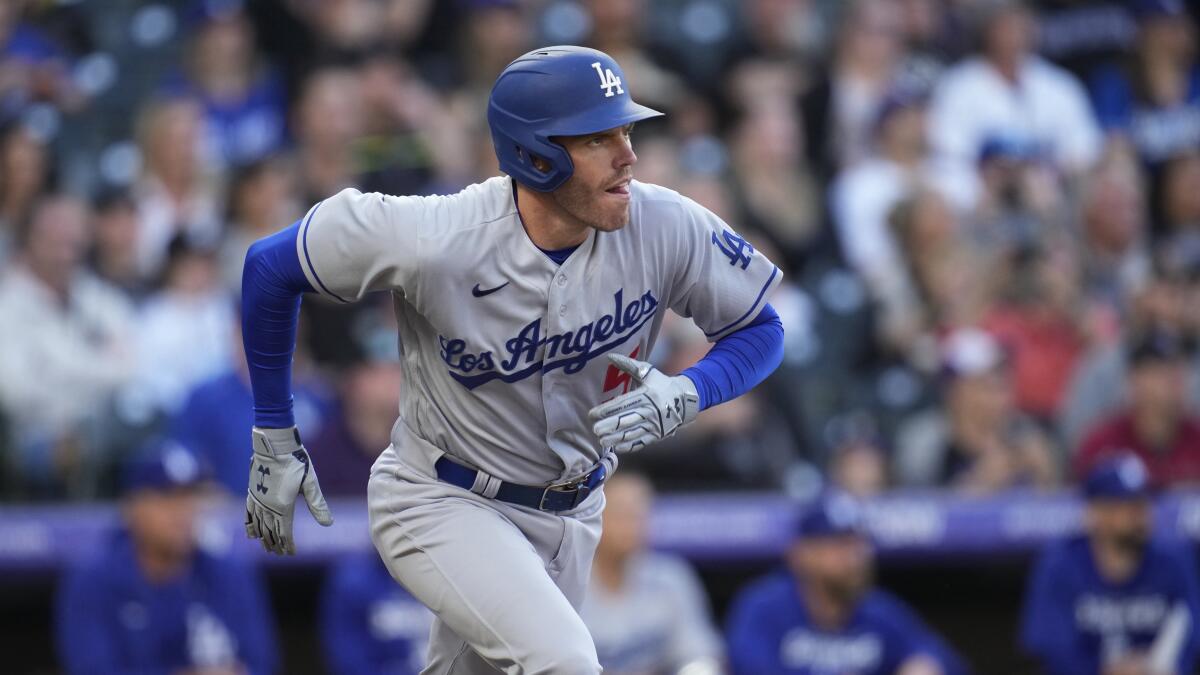 Los Angeles Dodgers Steve Sax is touched by the ball for an out as