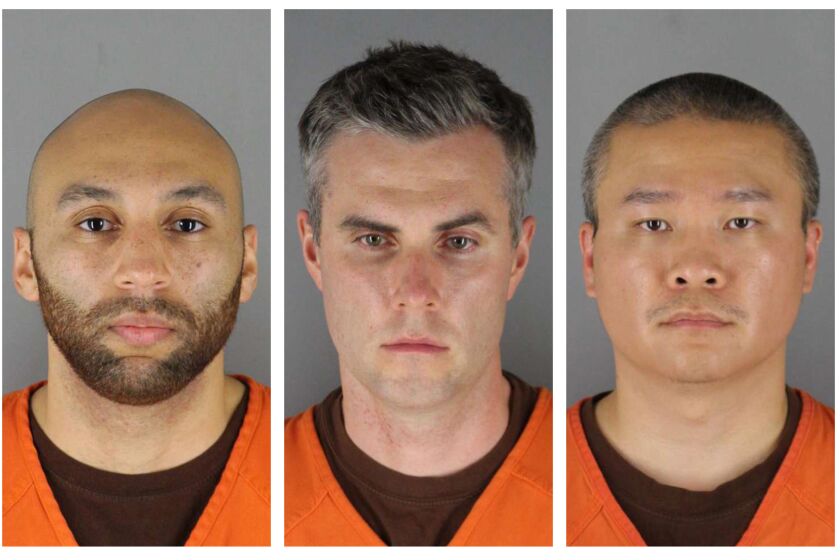 FILE - This combination of photos provided by the Hennepin County Sheriff's Office in Minnesota on June 3, 2020, shows, from left, former Minneapolis police officers J. Alexander Kueng, Thomas Lane and Tou Thao. The former policer officers are on trial in federal court accused of violating Floyd's civil rights as fellow Officer Derek Chauvin killed him. Judge Paul Magnuson abruptly recessed on Wednesday, Feb. 2, 2022 after one of the defendants tested positive for COVID-19. (Hennepin County Sheriff's Office via AP, File)