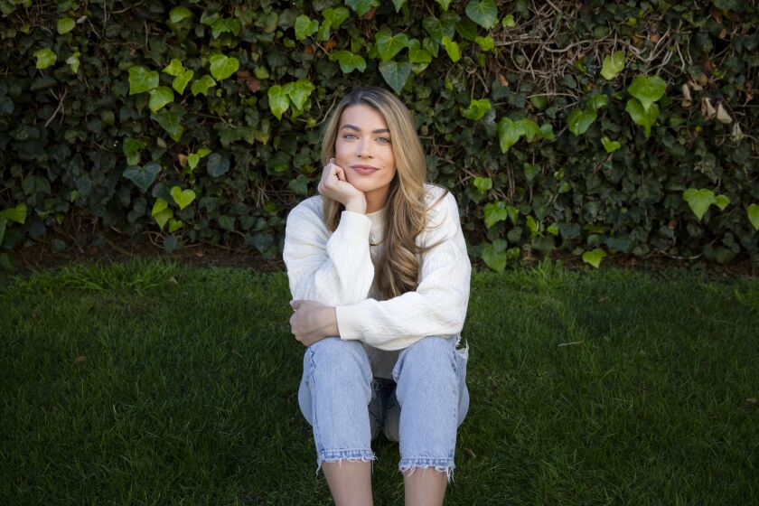 LOS ANGELES, CA - FEBRUARY 22: Former contestant on "The Bachelor," Sarah Trott, left the show to spend more time as a caregiver for her father who is living with ALS, and is photographed outside her residence in the Century City neighborhood of Los Angeles, CA, Monday, Feb. 22, 2021. Trott, a former San Diegan, started a Facebook group, "Sarah's Caregiver Community," as a place for people to discuss the realities of caring for loved ones. (Jay L. Clendenin / Los Angeles Times)
