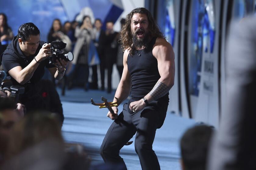 Jason Momoa arrives at the premiere of "Aquaman" at TCL Chinese Theatre on Wednesday, Dec. 12, 2018, in Los Angeles. (Photo by Jordan Strauss/Invision/AP)