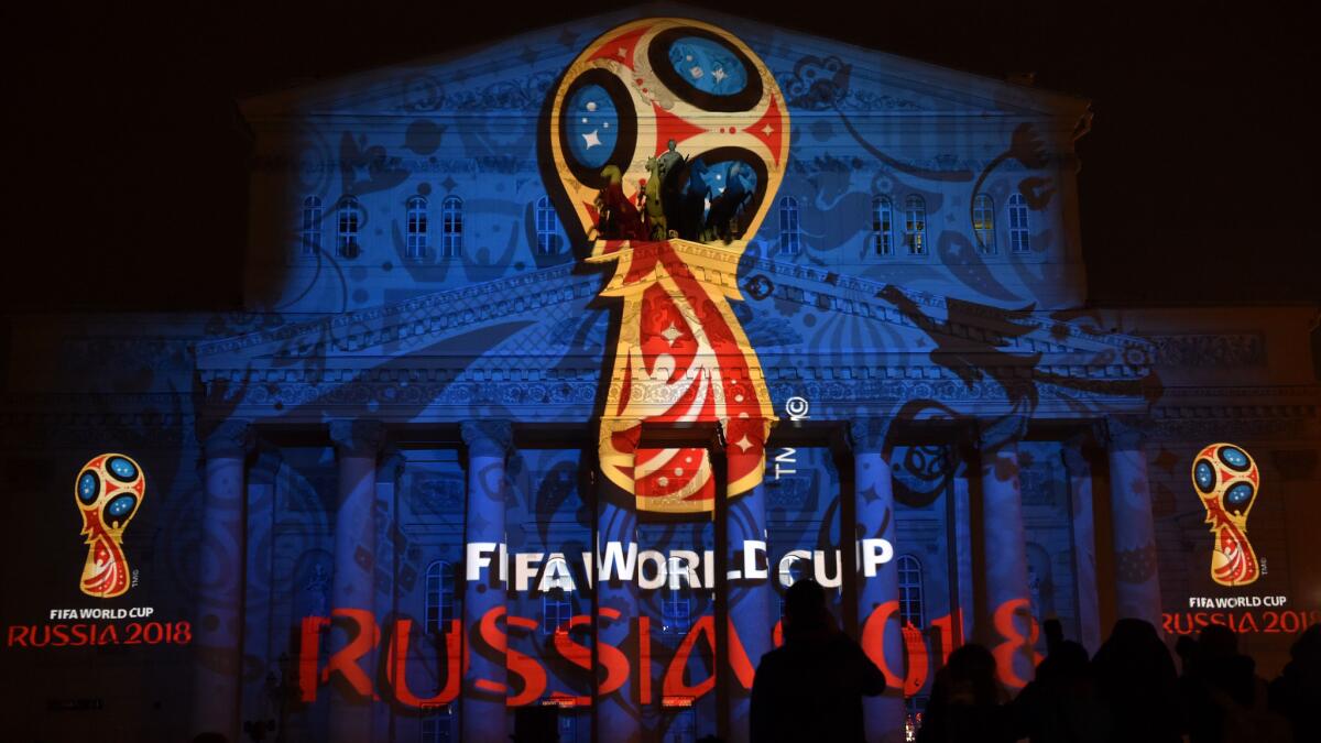 The official logo of the 2018 World Cup in Russia is projected on the Bolshoi Theatre in Moscow on Oct. 28.