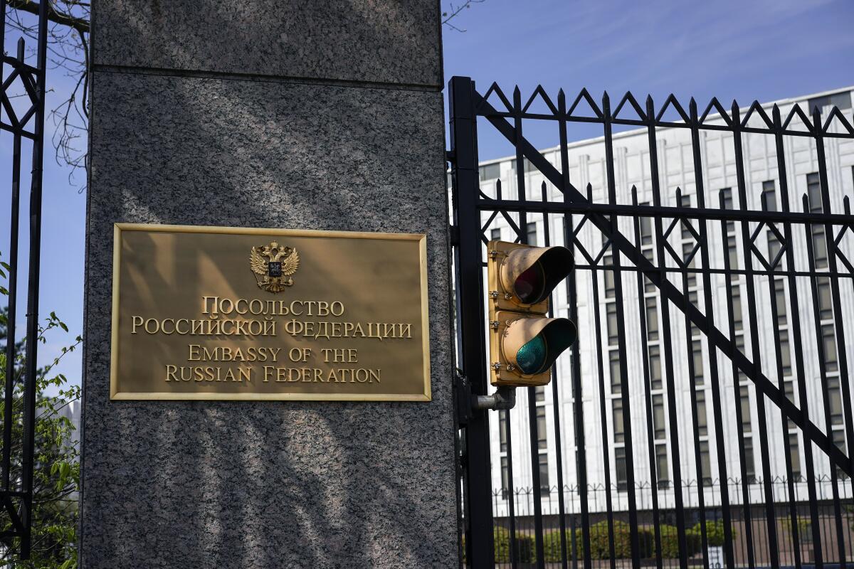 The entrance gate of the Embassy of the Russian Federation is seen in Washington, Thursday, April 15, 2021. The Biden administration has rolled out a sweeping set of sanctions on Russia over its election interference, hacking efforts and other malign activity. (AP Photo/Carolyn Kaster)