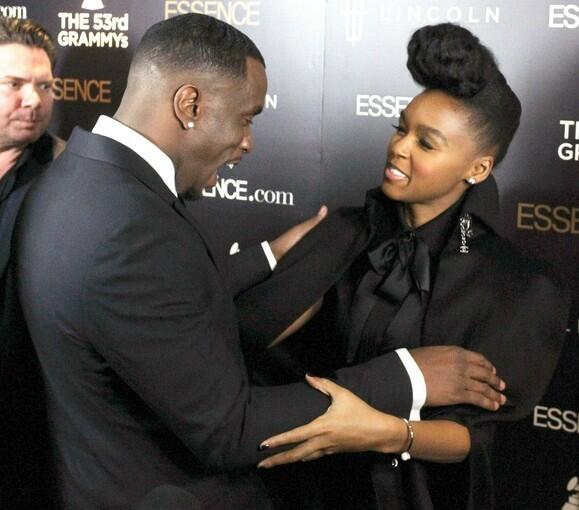 Sean "P. Diddy" Combs greets Janelle Monae on the red carpet.