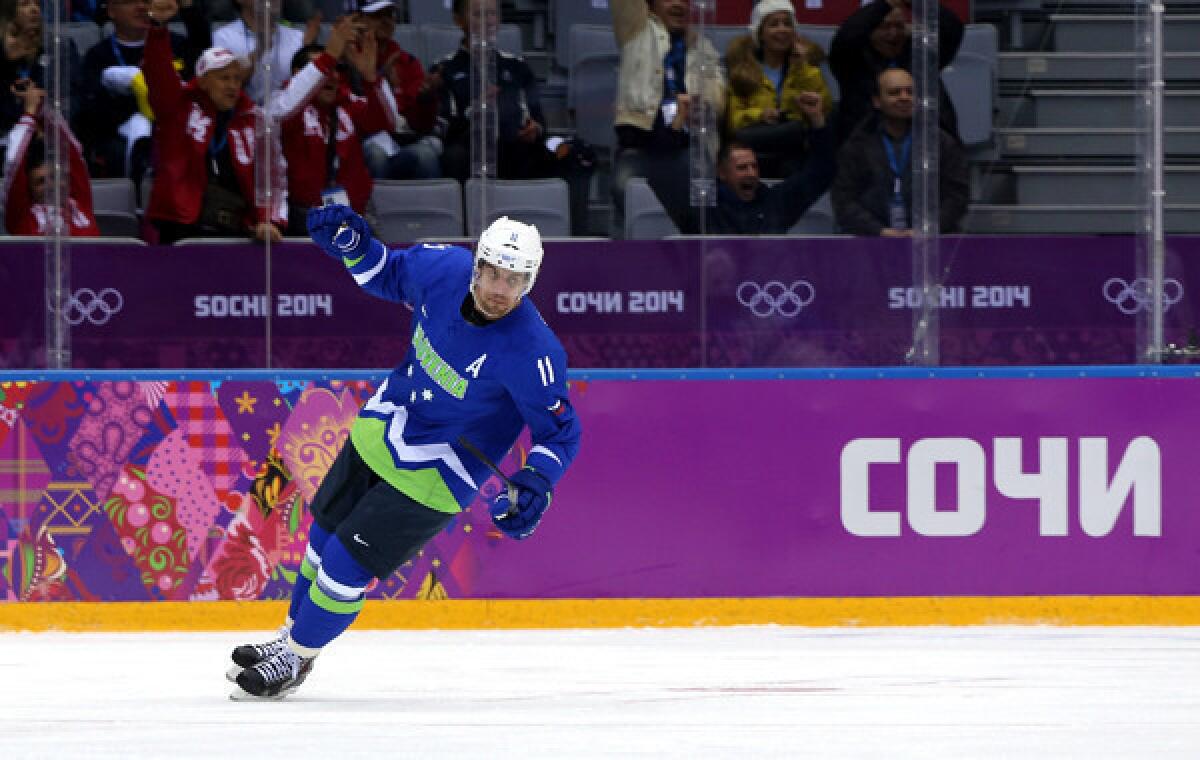 Kings center Anze Kopitar celebrates after scoring a goal for Slovenia against Austria in the Sochi Olympic Games on Feb. 18. Kopitar has played well since returning from the Olympic Games.
