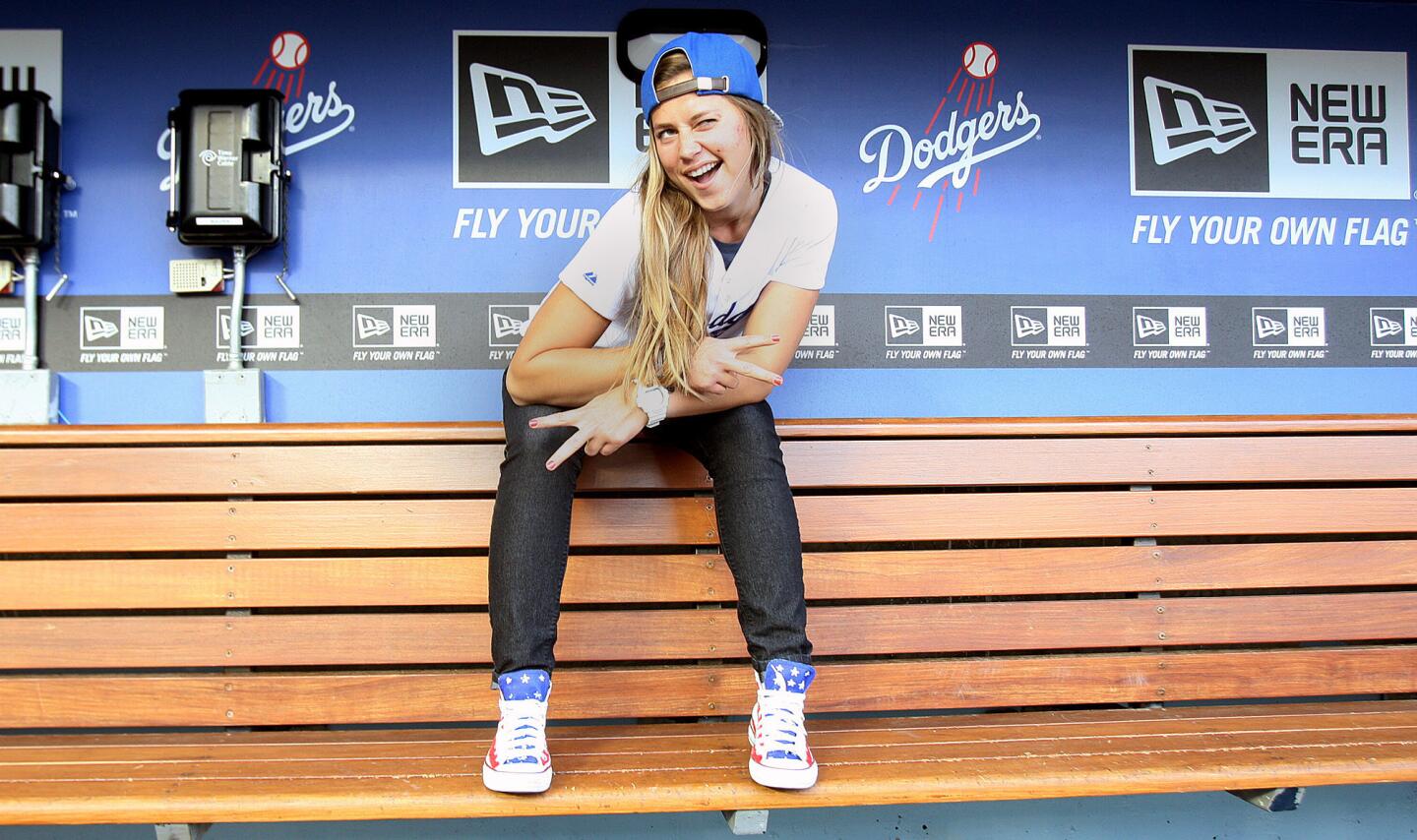 Photo Gallery: Olympian Kate Hansen throws out first pitch of Dodger game