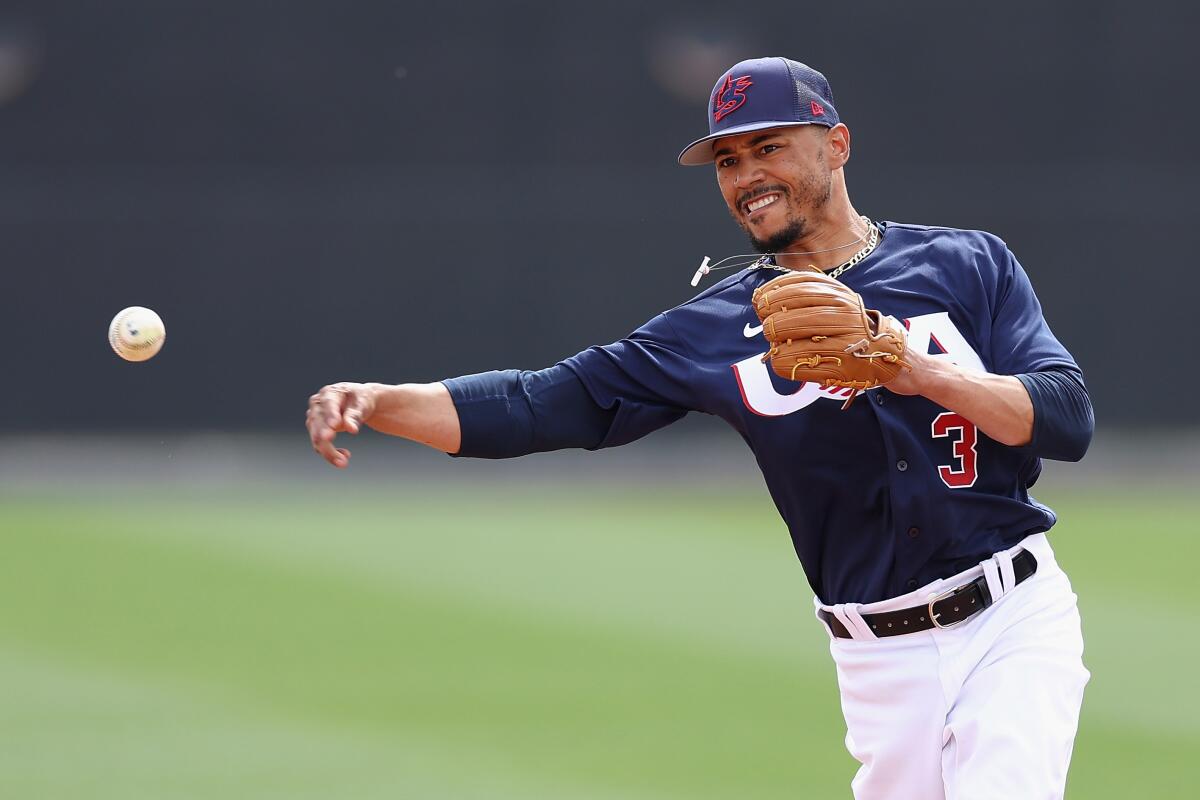 PHOENIX, ARIZONA - MARCH 07: Mookie Betts #3 of Team USA practices ahead of the World Baseball Classic.