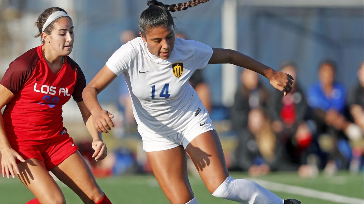 Marina High senior Erika Sosa (14), shown competing on Jan. 11, earned Sunset League Most Outstanding Offensive Player honors after scoring 28 goals this season.