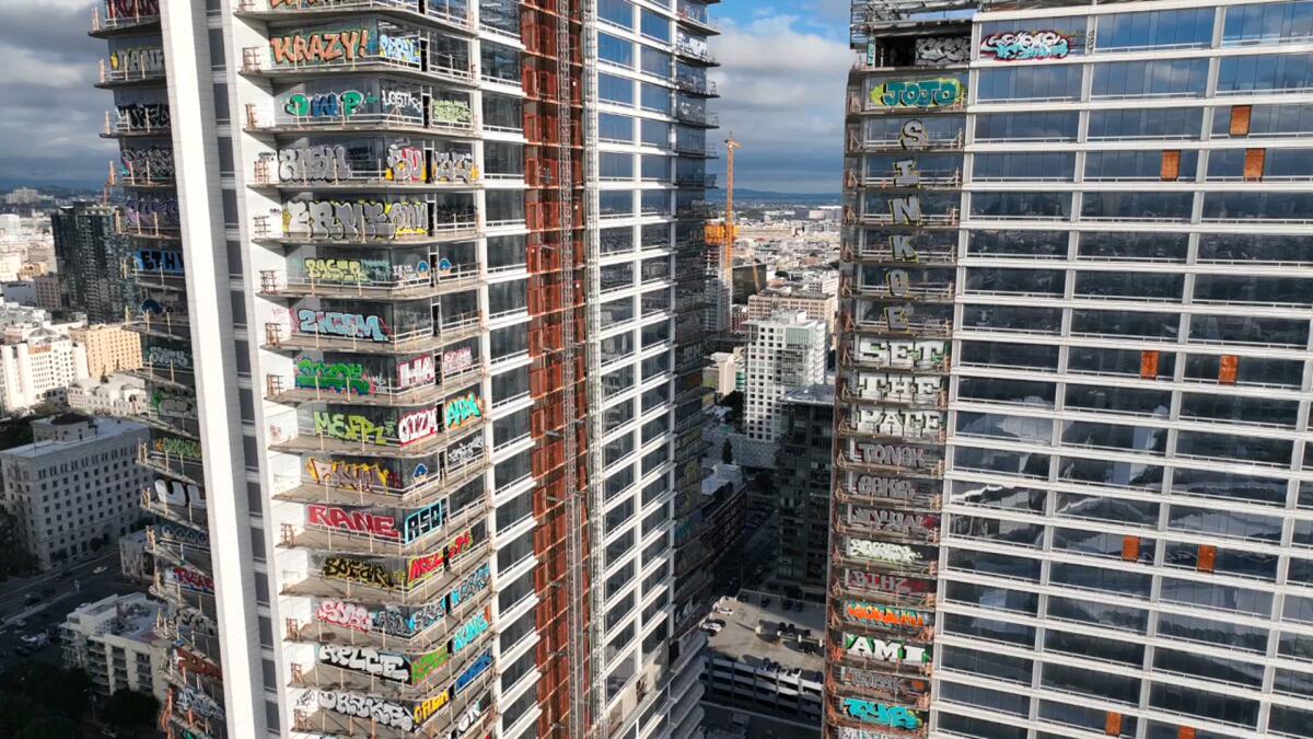 Taggers seen in action at graffiti-covered L.A. skyscraper