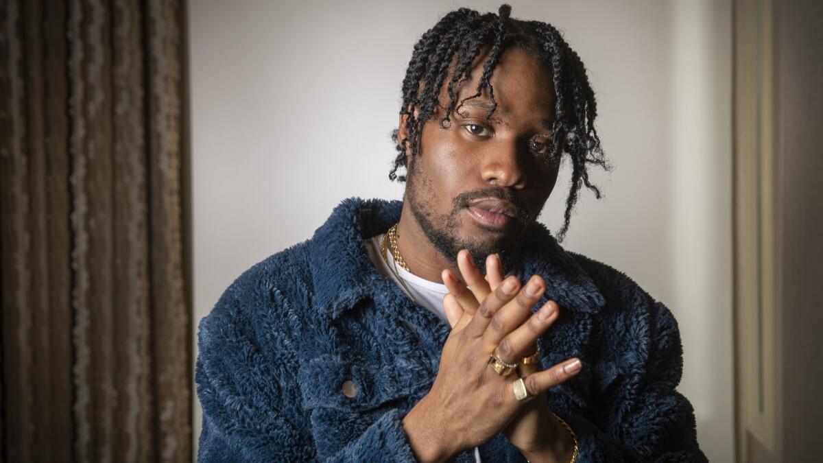 Actor Shameik Moore, who voices Miles Morales in Sony's animated "Spider-Man: Into the Spider-Verse," poses for portraits at the Four Seasons Hotel Los Angeles at Beverly Hills on Nov. 29, 2018.