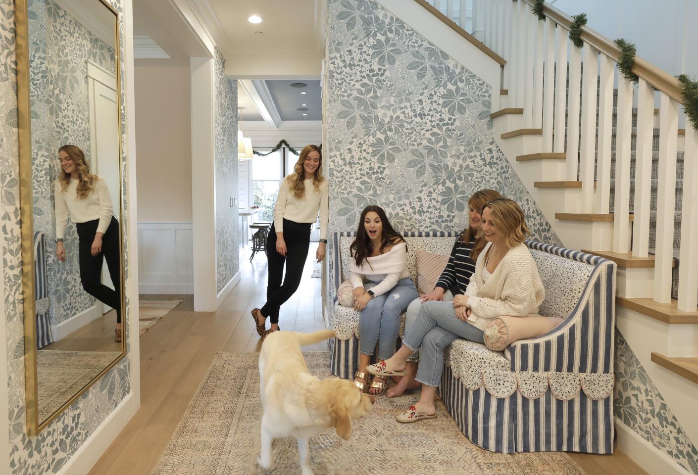 Victoria Aveyard, second from left, shares her house with her dog Indy; roommates Tori Ahl, far right; Morgan Bowser, second from right. Jen Rohrs, left, is a former roommate. The author of the popular young adult fantasy series, “Red Queen,” bought her “modern farmhouse” in 2017.