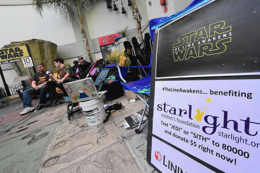 People camp out in front of the TCL Chinese Theater in Hollywood ahead of the first showing of Star Wars: the Force Awakens" the night of Dec. 17.
