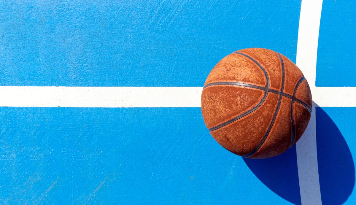 Basketball on court.