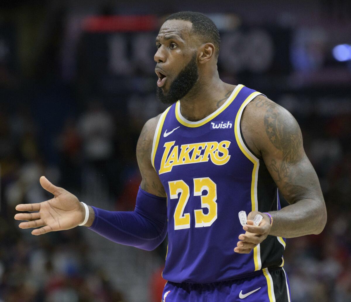 Los Angeles Lakers forward LeBron James (23) reacts to a call against the New Orleans Pelicans in the second half of an NBA basketball game in New Orleans, La. Saturday, Feb. 23, 2019.