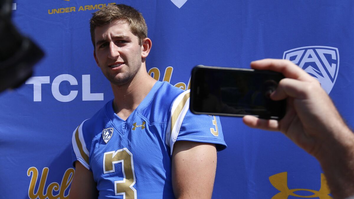 UCLA quarterback Josh Rosen, talking to reporters Sunday before the start of camp, is taking a more subdued approach.