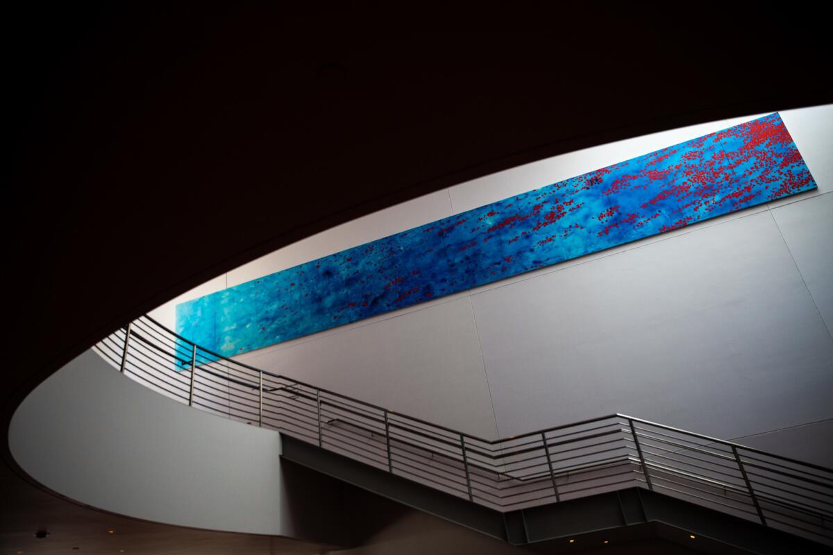 Peter Alexander's "Blue" hangs on a wall inside the Walt Disney Concert Hall.