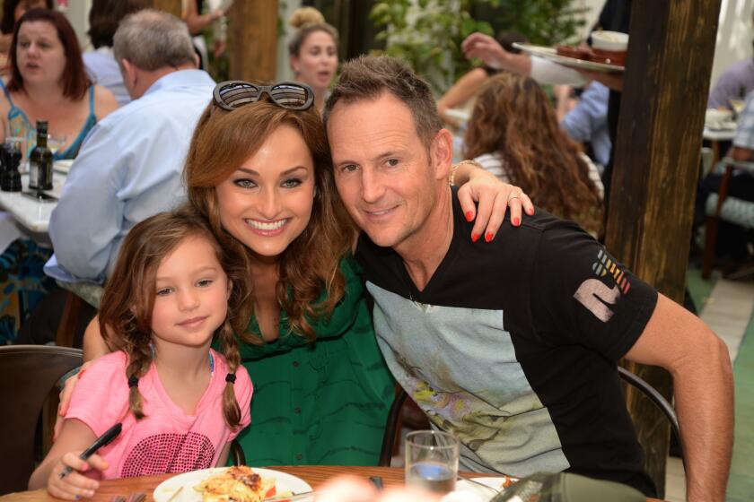 Celebrity chef Giada De Laurentiis announced split from husband Todd Thompson, right. Here, they are photographed with their daughter Jade, 6.
