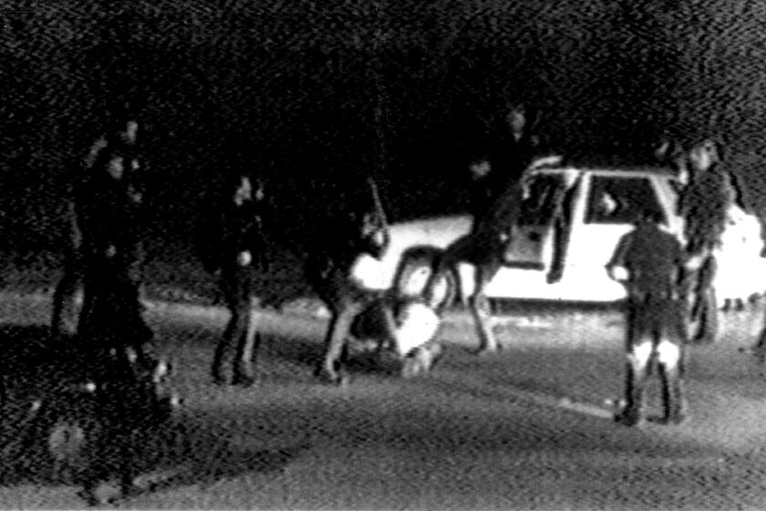 FILE - This March 31, 1991 image made from video shot by George Holliday shows police officers beating a man, later identified as Rodney King. King, the black motorist whose 1991 videotaped beating by Los Angeles police officers was the touchstone for one of the most destructive race riots in the nation's history, has died, his publicist said Sunday, June 17, 2012. He was 47. (AP Photo/Courtesy of KTLA Los Angeles, George Holliday)