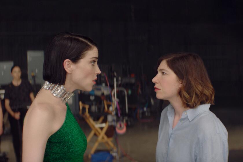 St. Vincent, left, as herself and Carrie Brownstein as herself in Bill Benz’s “The Nowhere Inn.” Courtesy of IFC Films