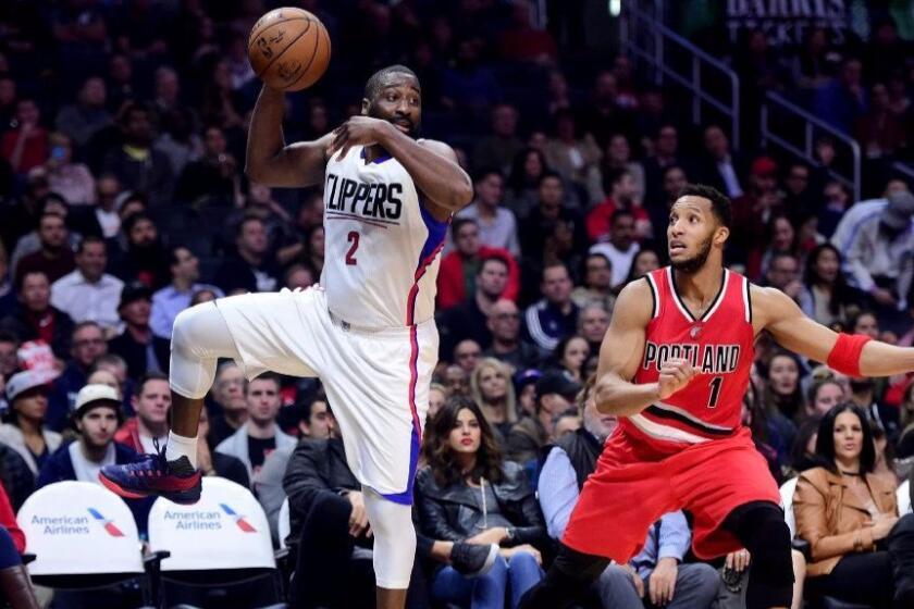 Clippers guard Raymond Felton shows defensive skills by intercepting a pass intended for Portland's Evan Turner.