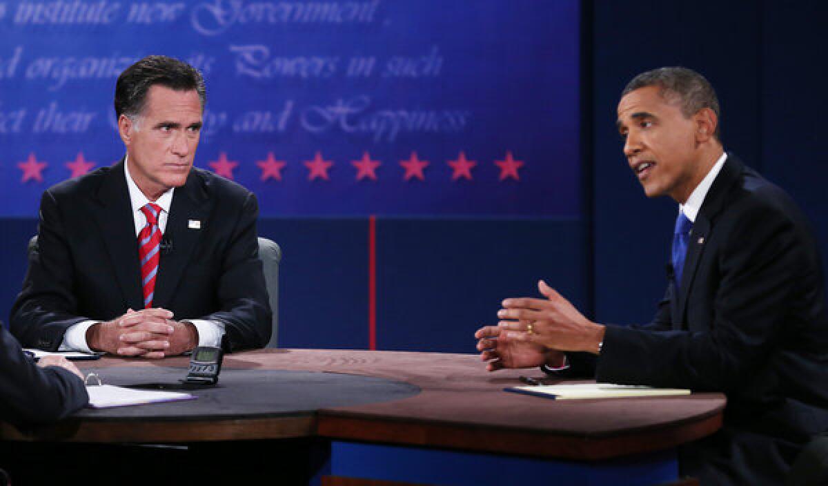 President Obama, right, debates with Republican presidential candidate Mitt Romney at Lynn University in Boca Raton, Florida.