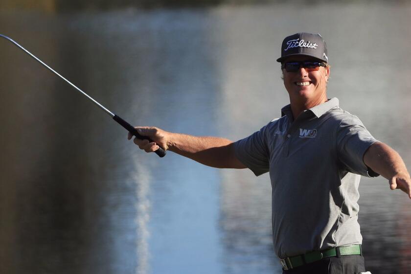 Charley Hoffman is all smiles after sinking a putt at No. 18 for his third consecutive birdie during the third round of the Arnold Palmer Invitational on Saturday.