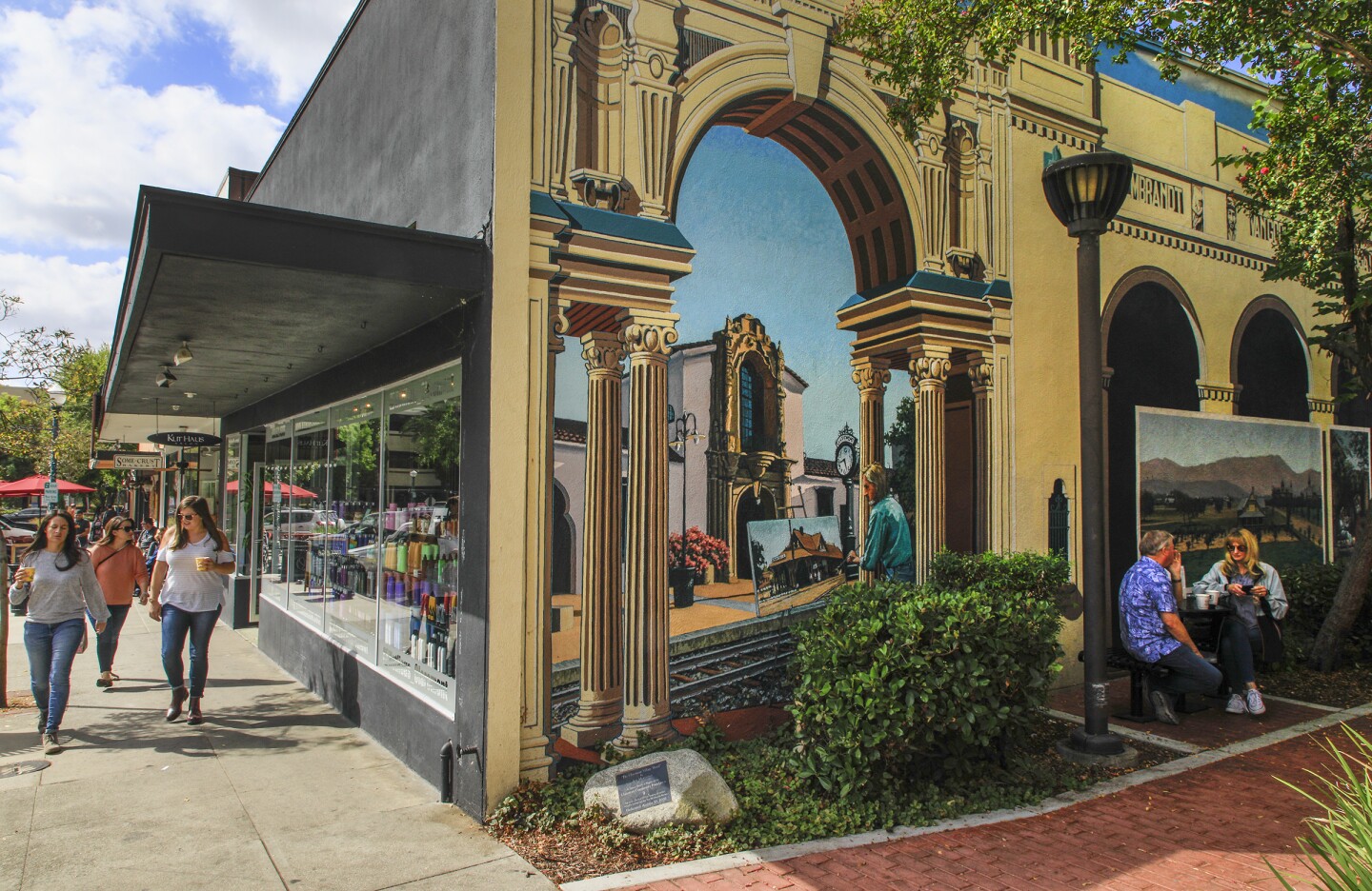 CLAREMONT, CA., SEPTEMBER 29, 2019: Artist Art Mortimer created a giant mural of historic street scenes in Claremont Village on the wall of the paseo at 123 Yale in the city of Claremont, located 30-miles east of Los Angeles at the base of the San Gabriel Mountains. The unique collection of old, restored buildings house record stores, antique shops, cafes and a bakery September 29, 2019 (Mark Boster For the LA Times).