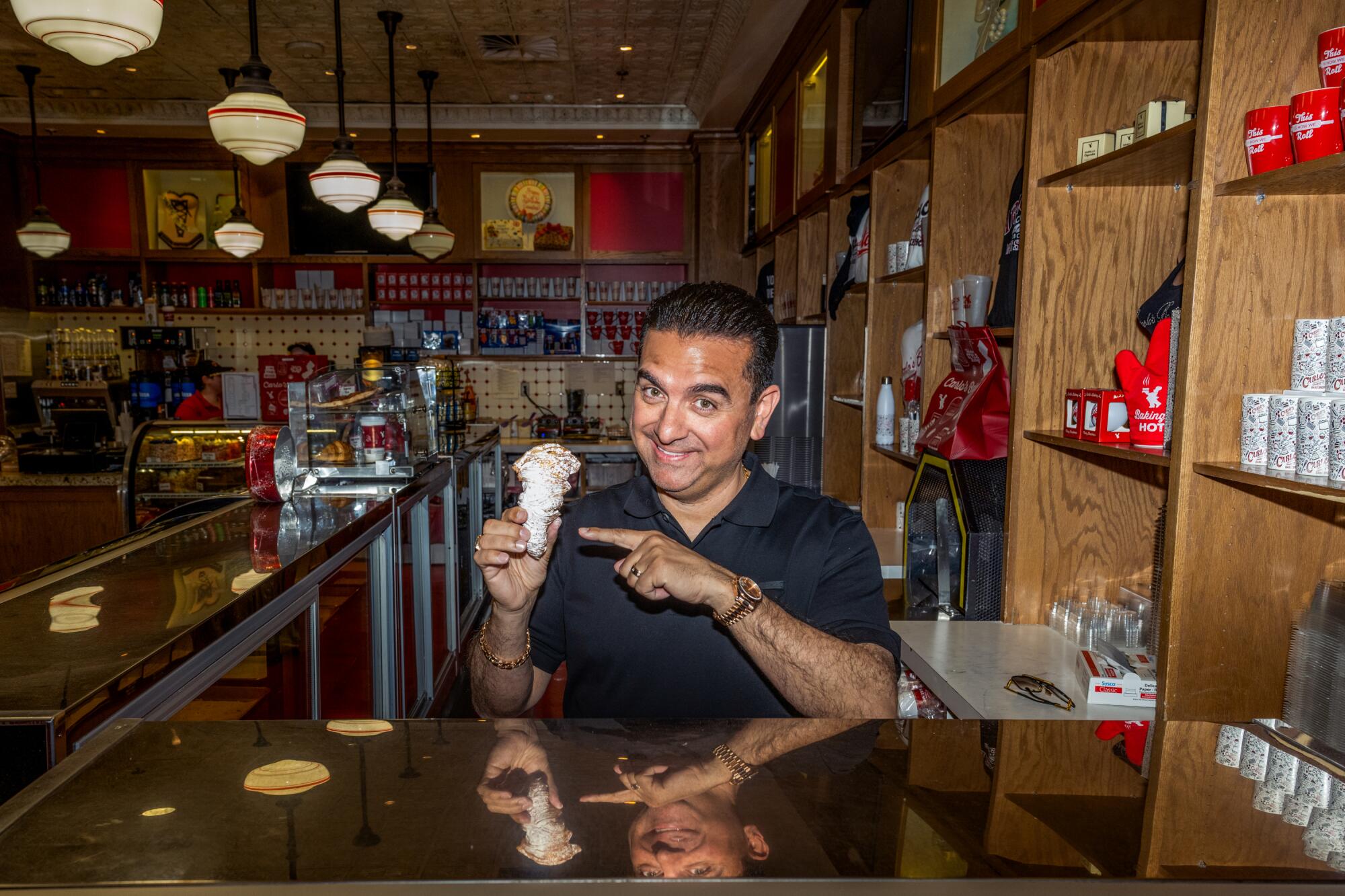 Buddy Valastro behind the counter at Carlo's Bakery in the Venetian in Las Vegas.
