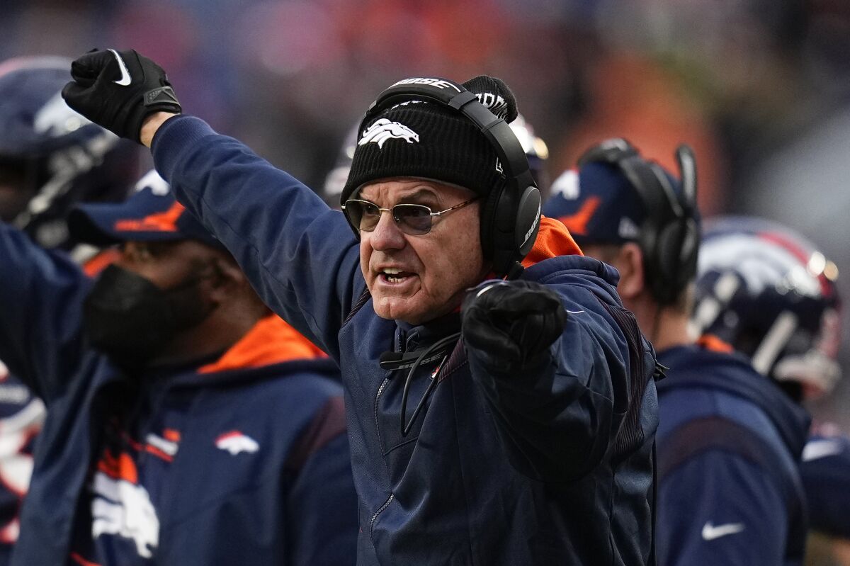 FILE - Denver Broncos defensive coordinator Ed Donatell reacts against the Kansas City Chiefs during an NFL football game Saturday, Jan. 8, 2022, in Denver. Donatell has agreed to become the defensive coordinator of the Minnesota Vikings under head-coach-to-be Kevin O'Connell, according to a person with knowledge of the decision. The person spoke to The Associated Press on condition of anonymity on Thursday, Feb. 10, 2022, because the Vikings have not yet announced the hire. (AP Photo/Jack Dempsey, File)