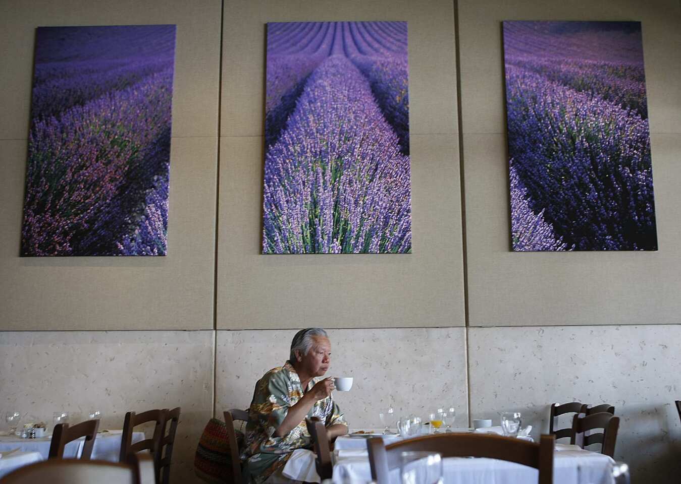 Pacific Palisades resident Ernie Wong sips a coffee during Sunday brunch at Maison Giraud.
