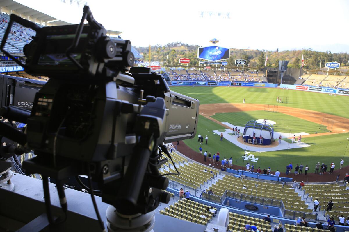 Time Warner Cable is losing more than $100 million a year on its contract to carry SportsNet LA, according to sources. Time Warner Cable said it won't have to take a write down to account for the losses.