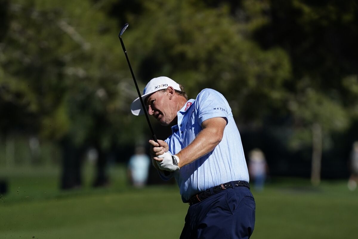 Ernie Els hits an approach shot during the Charles Schwab Cup Championship in November.