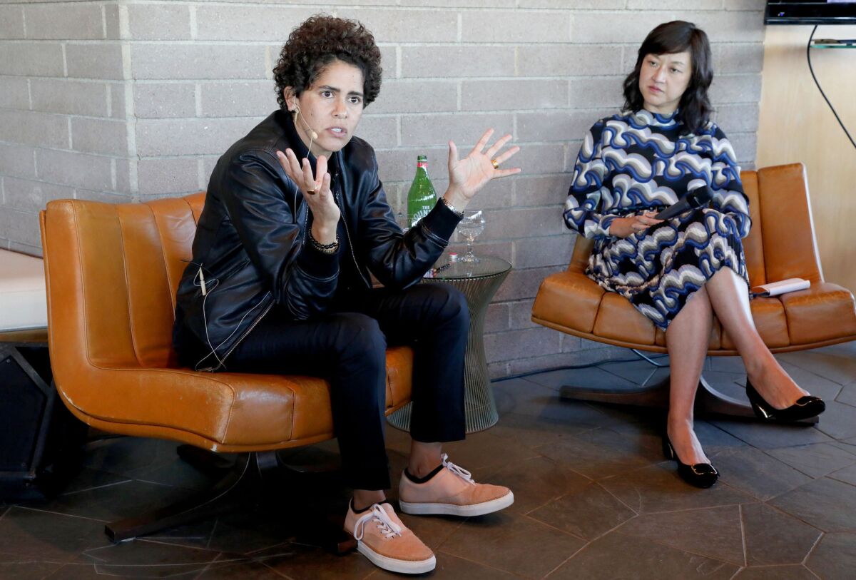 Artist Julie Mehretu, left, and Christine Y. Kim, LACMA's associate curator of contemporary art, lead a discussion during Visionary Women Presents: Women in the Arts on Oct. 15 in Los Angeles.