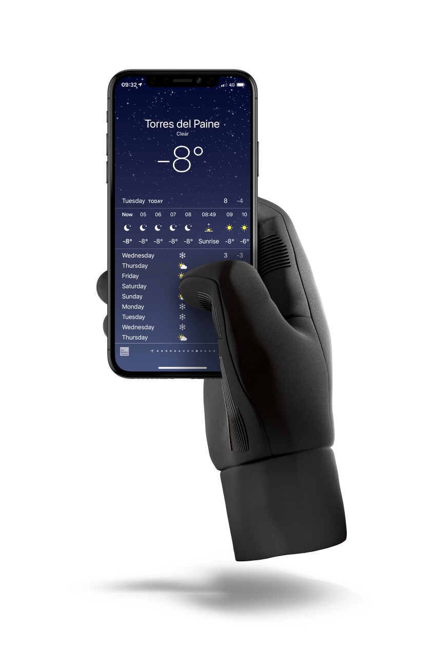 A black glove holding a smartphone with a weather reading of -8 degrees on the screen.