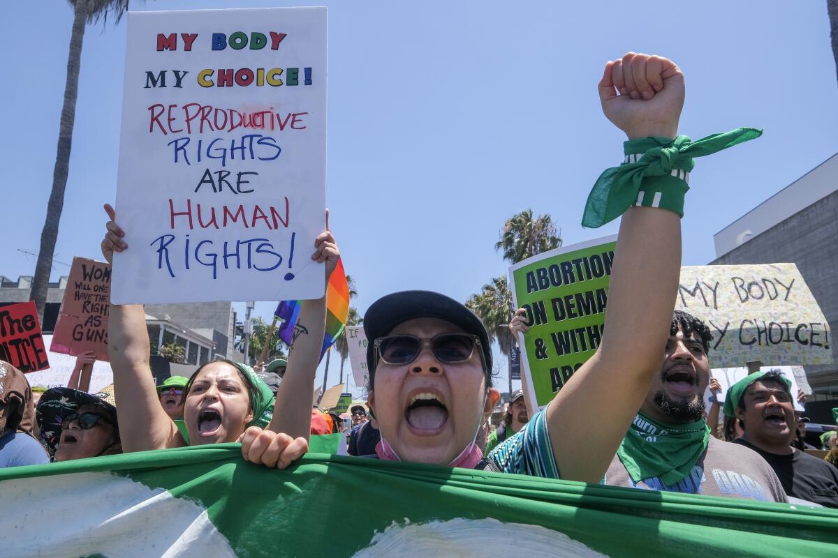 Abortion-rights activists take part in a National Day of Protest on July 4 in the Venice neighborhood of Los Angeles.