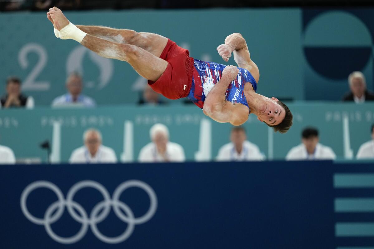 American Brody Malone competes on the floor exercise during men's gymnastics qualifying at the Paris Olympics 