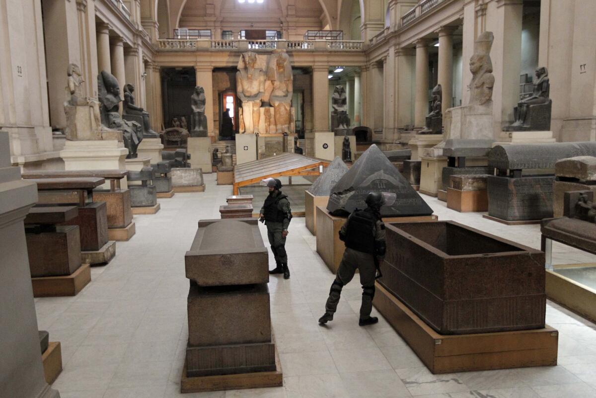 Troops secure the main floor of the famed Egyptian Museum in Cairo after looters broke in during the revolution in early 2011.
