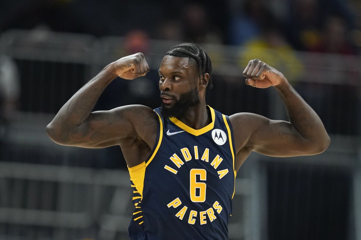 Indiana Pacers' Lance Stephenson reacts after making a shot during the first half of an NBA basketball game against the Washington Wizards, Wednesday, Feb. 16, 2022, in Indianapolis. (AP Photo/Darron Cummings)