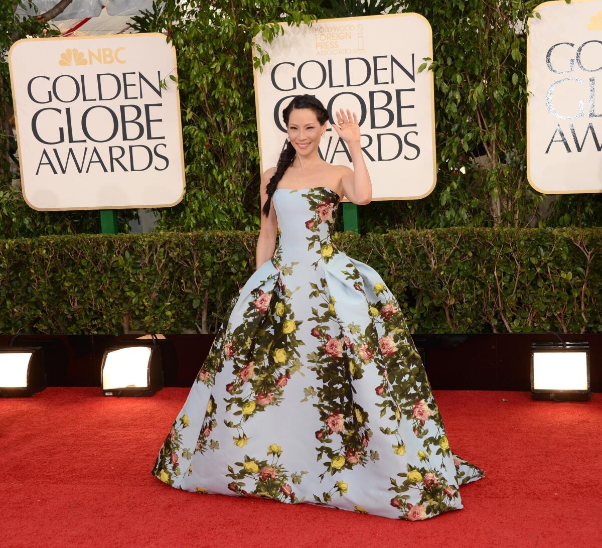 Lucy Liu's blue rose-patterned Carolina Herrera gown made her look like she was ready for a costume ball.