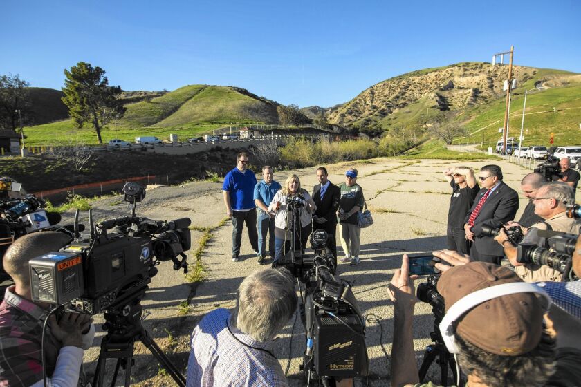 Paula Cracium, president of the Porter Ranch Neighborhood Council, speaks at a news conference after it was announced that the Aliso Canyon gas leak had been halted.