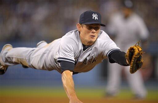 Dodgers beat Yankees on Mark Ellis' walk-off single