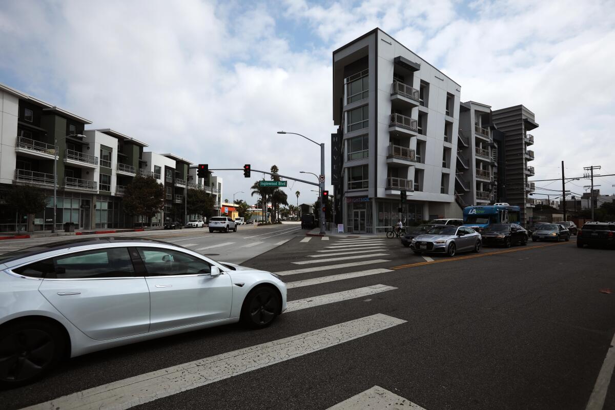 Race for more EV charging stations at offices and apartments