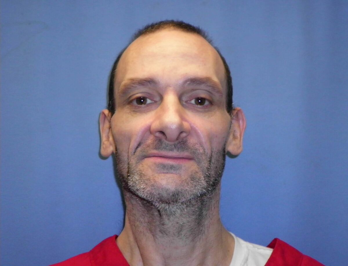This undated photo provided by the Mississippi Department of Corrections shows David Neal Cox. The Mississippi Supreme Court has set a Nov. 17, 2021, execution date for Cox, who withdrew his appeals. He pleaded guilty in September 2012 to shooting his wife Kim in May 2010 in the town of Sherman, sexually assaulting her daughter in front of her, and watching Kim Cox die as police negotiators and relatives pleaded for her life. (Mississippi Department of Corrections via AP)