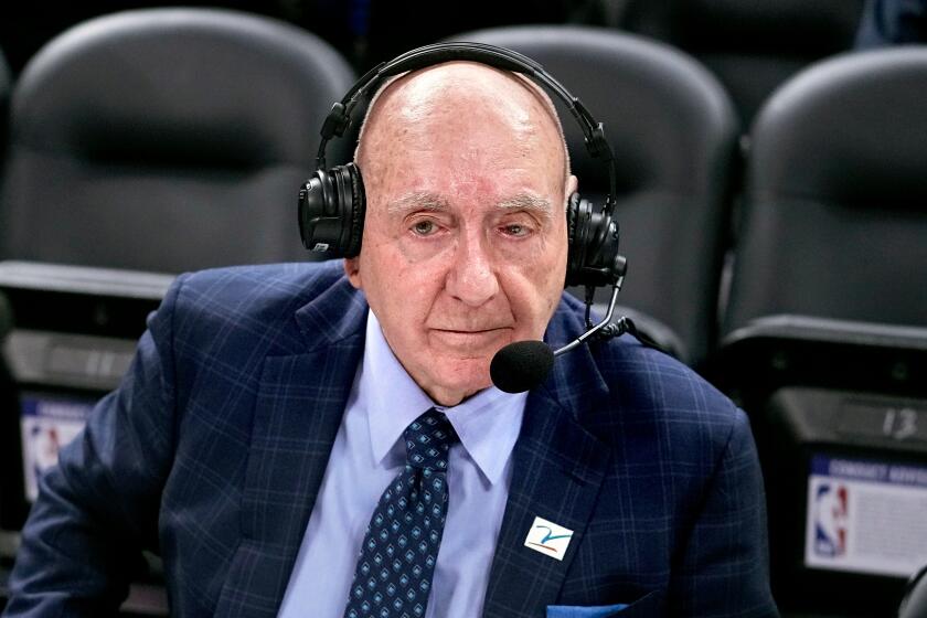 Dick Vitale prepares to announce an NCAA college basketball game between Michigan State and Kentucky.