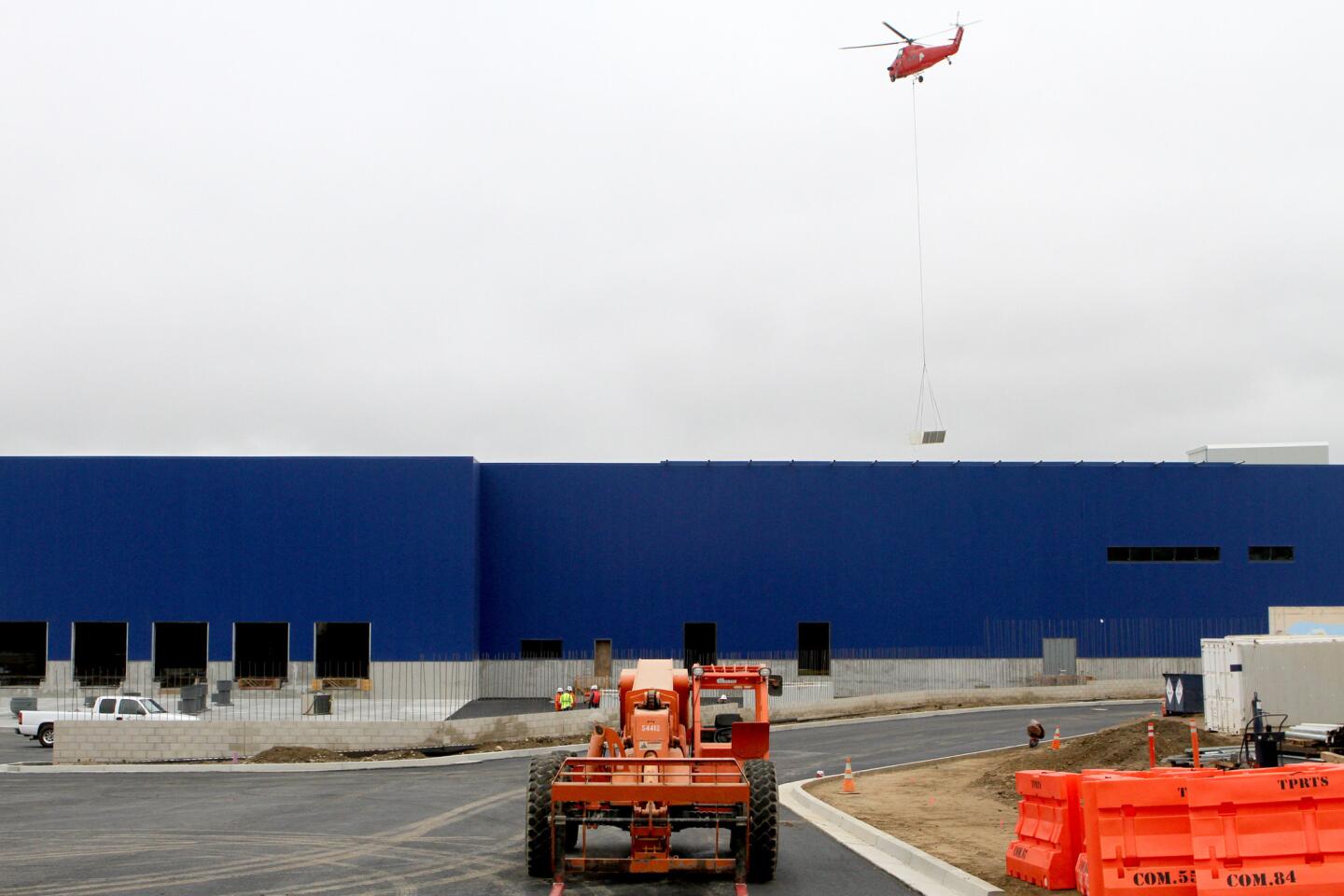 Photo Gallery: Air-conditioning units air-lifted to new Burbank Ikea store roof