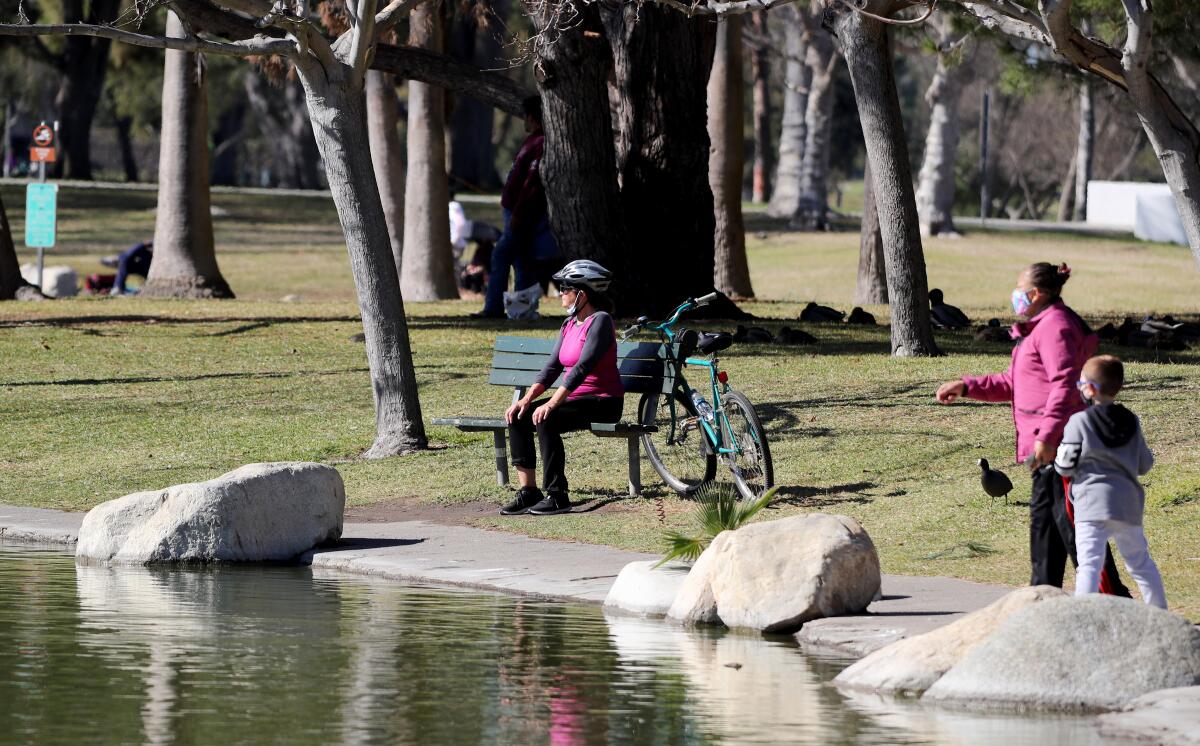 People enjoy a sunny day at Mile Square Park in Fountain Valley in this 2021 photo.