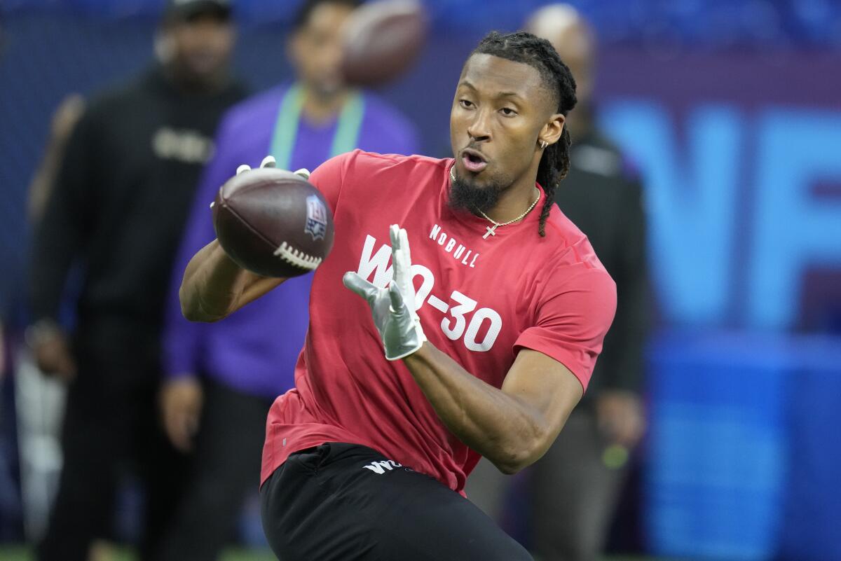 Wide receiver Quentin Johnston runs a drill at the NFL Scouting Combine in March.
