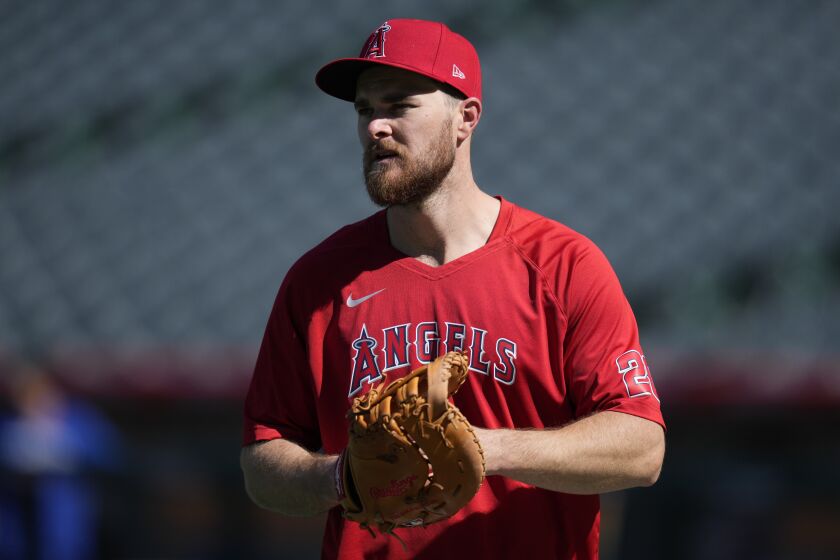 The Angels' Jared Walsh looks on during batting practice before a game against Kansas City on April 21, 2023.