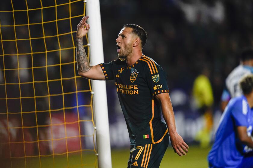 LA Galaxy forward Billy Sharp celebrates after scoring a goal for a hat trick against Minnesota United during the second half of an MLS soccer match Wednesday, Sept. 20, 2023, in Carson, Calif. (AP Photo/Ryan Sun)